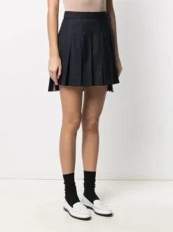 Skirts>THOM BROWNE Thigh Length Dropped Back Pleated Skirt In Super 120’S Twill