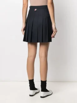 Skirts>THOM BROWNE Thigh Length Dropped Back Pleated Skirt In Super 120’S Twill